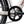 Close up of the chainring guard and crank on the cream Batribike SUV S with a Kenda tyre behind
