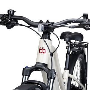 Front light, head tube logo and SR Suntour suspension fork on the cream Batribike SUV S