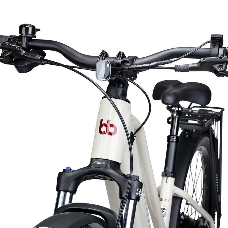 Front light, head tube logo and SR Suntour suspension fork on the cream Batribike SUV S