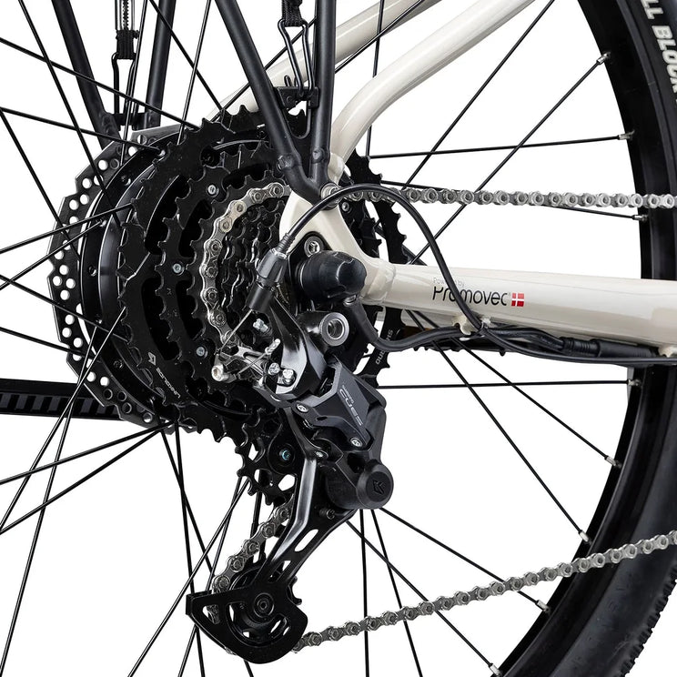 Shimano CUES rear derailleur and cassette on the cream Batribike SUV S with Promovec hub motor