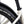 Close up of the Kenda Small Block Eight tyre and mudguard on the cream Batribike SUV S