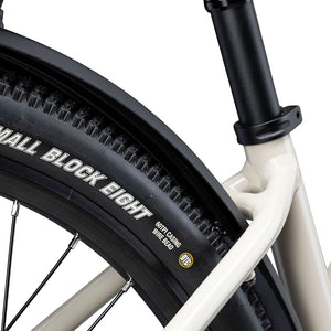 Close up of the Kenda Small Block Eight tyre and mudguard on the cream Batribike SUV S