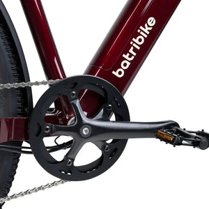 Close up of the black crankset and pedal on the oxblood Batribike SUV X with integrated battery frame.