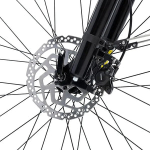 Close up of a Shimano hydraulic disc brake caliper and rotor on the Batribike SUV X front fork.