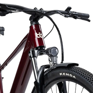 Close up of the Batribike SUV X oxblood head tube front suspension fork and integrated front light.