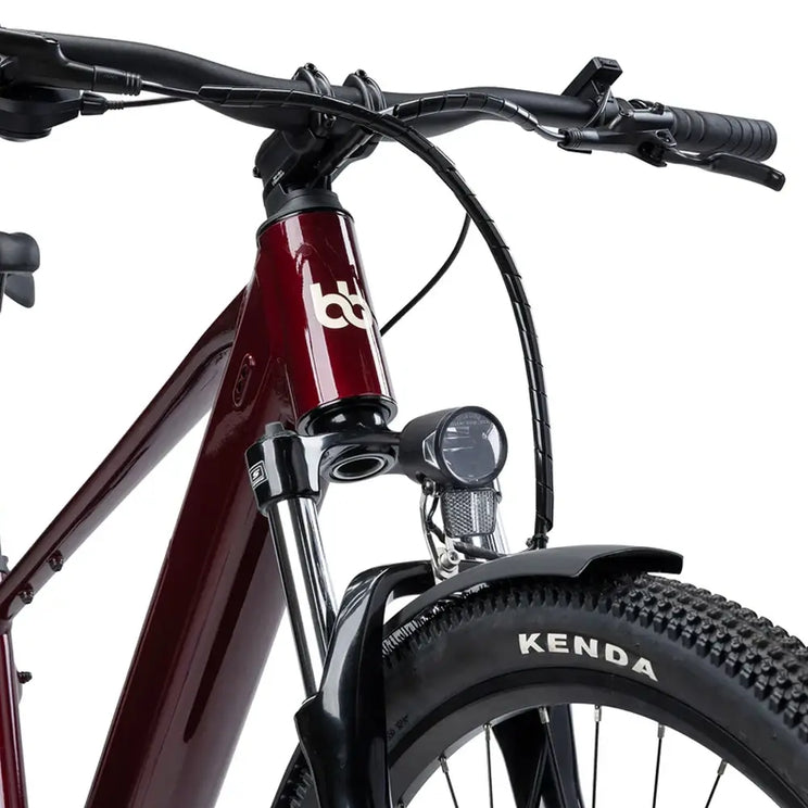 Close up of the Batribike SUV X oxblood head tube front suspension fork and integrated front light.