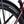 Close up of a Kenda tyre fitted beneath the black mudguard on the oxblood Batribike SUV X.