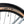 Close up of a WTB Riddler 45 700c tan wall tyre fitted to the Batribike Tour S grey alloy wheel.