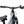 Flat handlebar with display, bell and shifter above the grey Batribike Tour X frame and fork