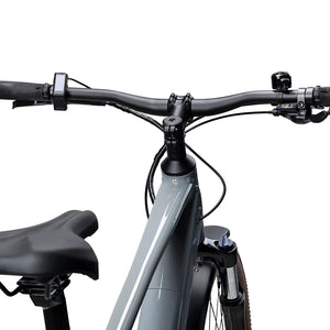 Flat handlebar with display, bell and shifter above the grey Batribike Tour X frame and fork