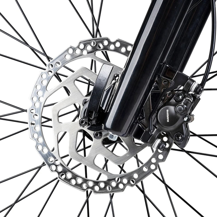 Shimano disc brake caliper and drilled rotor on the front fork of the Batribike Trail