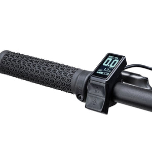 Compact LCD display and control pad next to the textured grip on the Batribike Trail handlebar