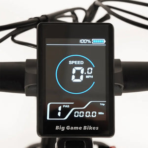 Close-up view of the Big Game Bikes Buffalo Mountain Electric Bike's digital display showing speed and battery level.