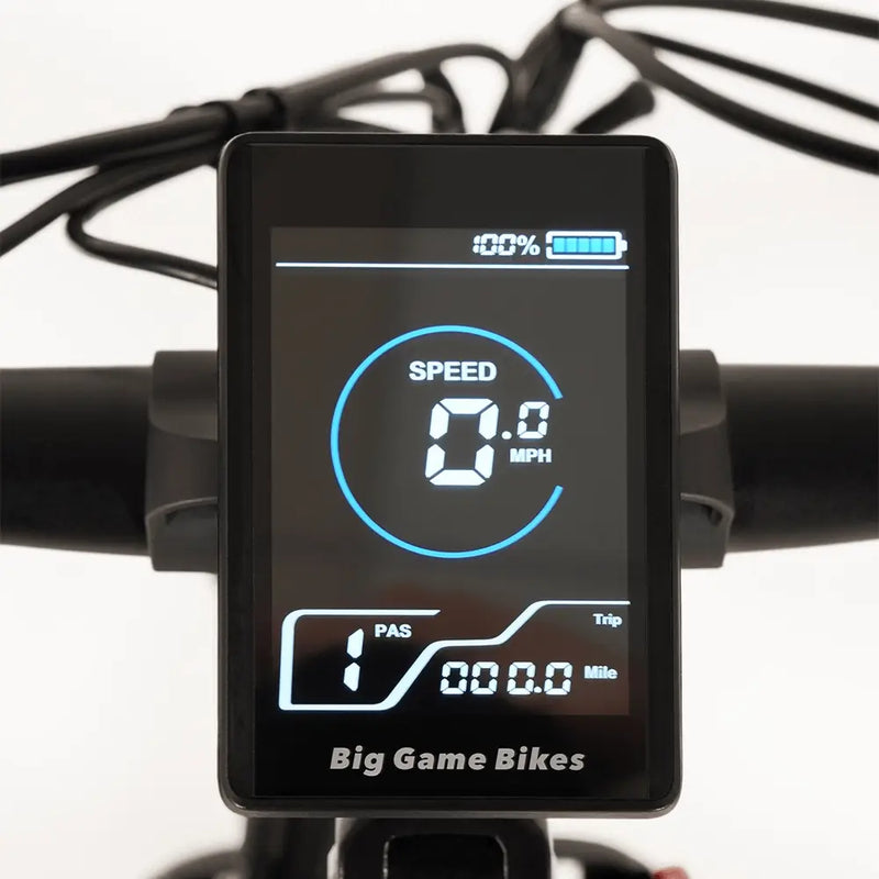 Close-up view of the Big Game Bikes Buffalo Mountain Electric Bike's digital display showing speed and battery level.