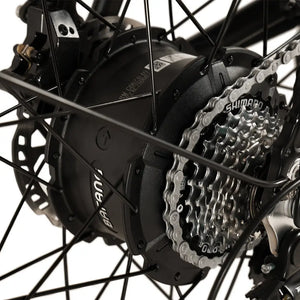 Close-up detail of the powerful Bafang rear hub motor and Shimano gear cassette on the Big Game Bikes Buffalo electric mountain bike, designed for reliable off-road performance.