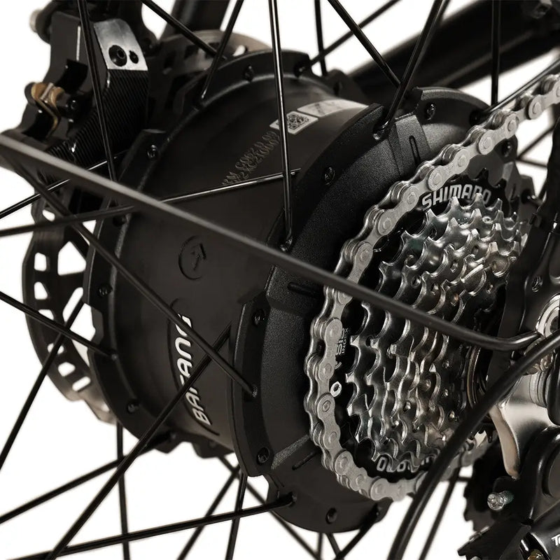 Close-up detail of the powerful Bafang rear hub motor and Shimano gear cassette on the Big Game Bikes Buffalo electric mountain bike, designed for reliable off-road performance.