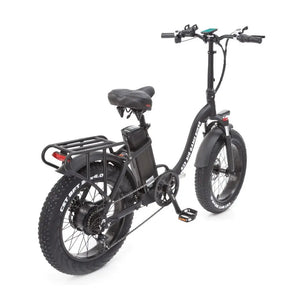 Rear-side view of the Big Game Bikes Impala e-bike showing wide tyres, rear carrier, and upright riding posture.