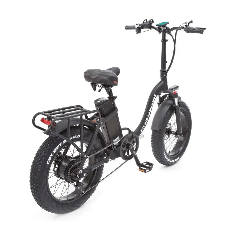 Rear-side view of the Big Game Bikes Impala e-bike showing wide tyres, rear carrier, and upright riding posture.