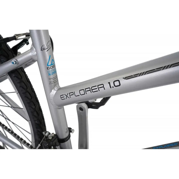 Close-up of the "EXPLORER 1.0" model name and 6061 aluminium frame sticker on the top tube.