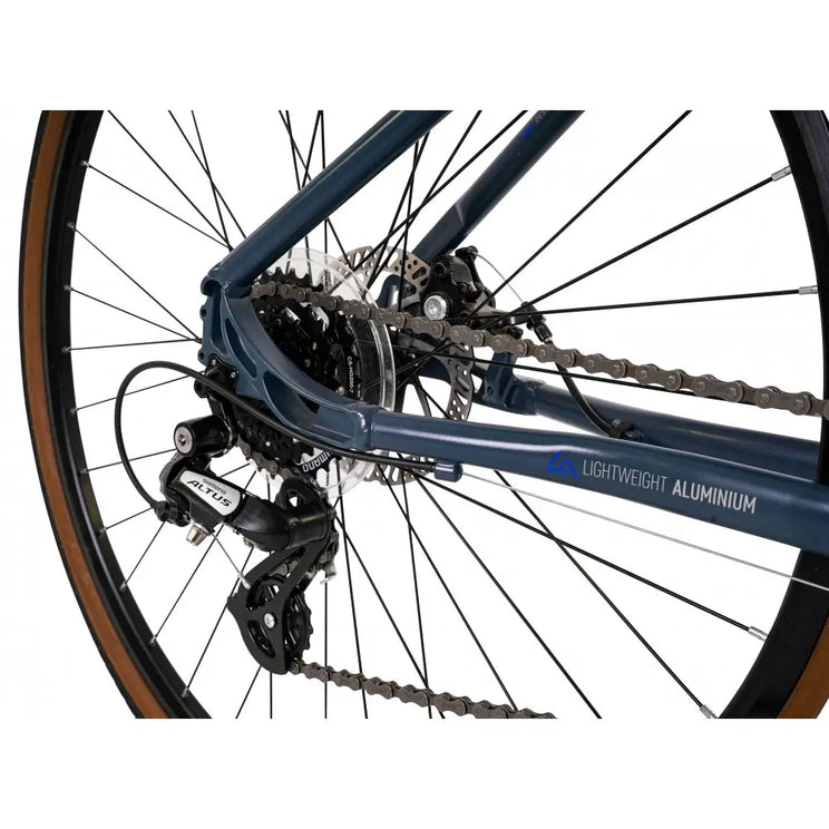 Close-up of the Shimano rear derailleur and 7-speed cassette on the red Explorer 3.0 Low Step.