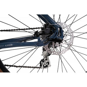 Close-up of the rear mechanical disc brake and Shimano drivetrain on the lightweight aluminium frame of the Claud Butler Explorer 3.0 Hybrid Bike.