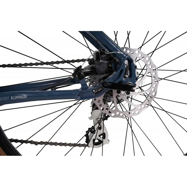 Close-up of the rear mechanical disc brake and Shimano drivetrain on the lightweight aluminium frame of the Claud Butler Explorer 3.0 Hybrid Bike.