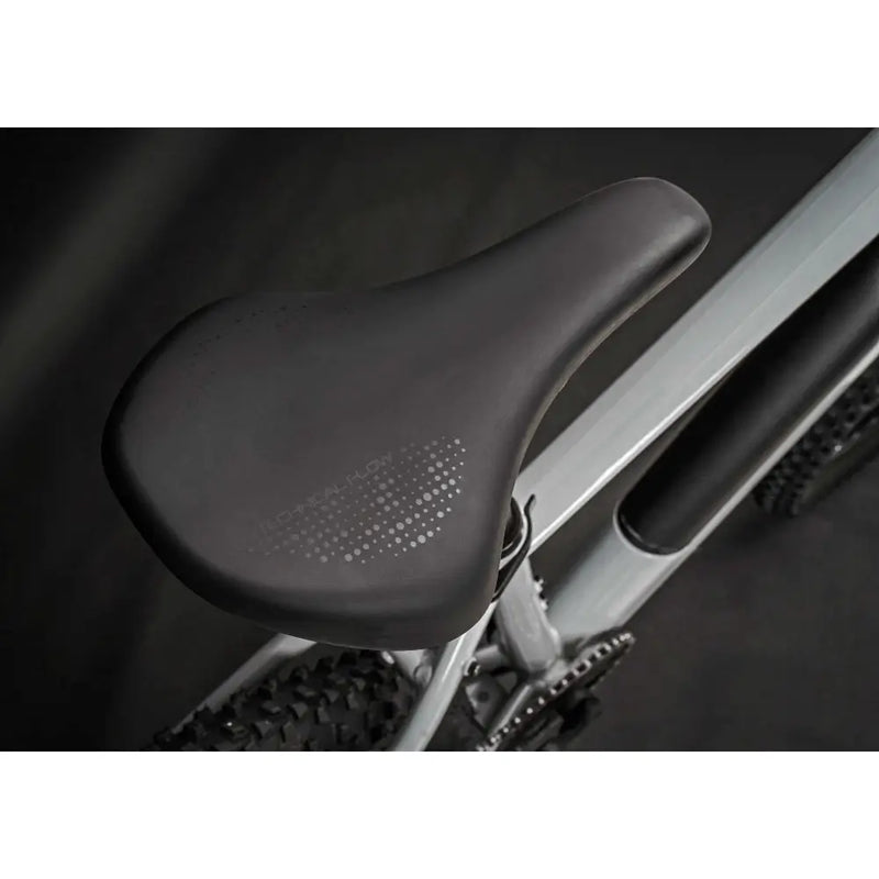 Close-up view of the comfortable saddle on the Claud Butler Ridge 1.0 electric mountain bike 250W 2025, designed for off-road riding.