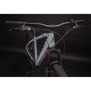 Front angled view of Claud Butler Ridge 1.0 electric mountain bike showing frame design and front suspension fork.