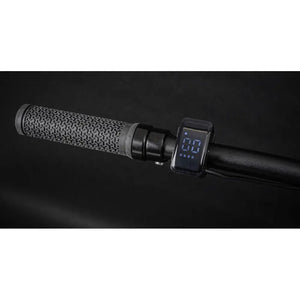 Close-up view of the Claud Butler Ridge 1.0 electric mountain bike display on the handlebar showing speed and assist level.