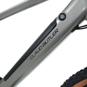 Close-up of the Claud Butler Ridge 2.0 electric mountain bike frame showing the integrated battery and Claud Butler branding on the down tube.