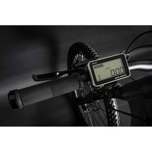 Close-up of the Claud Butler Wrath 1.0 Cues electric mountain bike LCD display showing speed and settings, mounted on the handlebar.