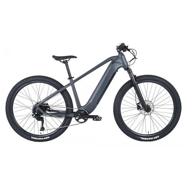 Side profile of the Claud Butler Wrath 1.0 Cues electric mountain bike, showcasing its sleek integrated battery, hardtail frame, and off-road ready 29-inch wheels.