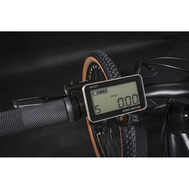 Close-up view of the Claud Butler Wrath 2.0 Cues electric mountain bike LCD display showing speed and battery level.