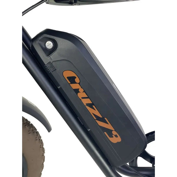 Close-up of the Cruz73 Mariner Retro Special Edition electric bike battery pack integrated into the frame.