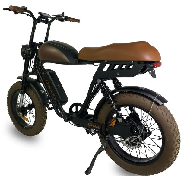 Rear-side view of the Cruz73 Mariner Retro Special Edition  electric bike with brown seat and fat tyres.