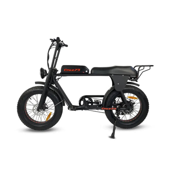 Right side view of the Cruz73 Retro Fat Tyre Electric Bike 250W in black, showcasing sturdy frame, rear rack, and large knobby tyres.