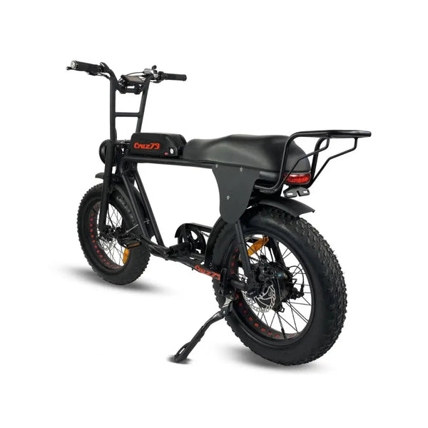 Back-side view of the Cruz73 Retro Fat Tyre Electric Bike 250W showing the rear rack, wide seat, and all-terrain tyres.