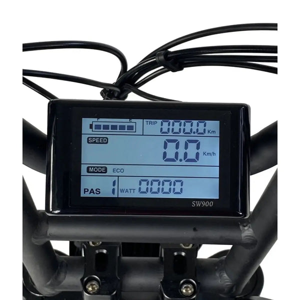 Close-up of the Cruz73 Unlimited Retro Fat Tyre 750W electric bike SW900 LCD display showing speed, trip, and mode settings.