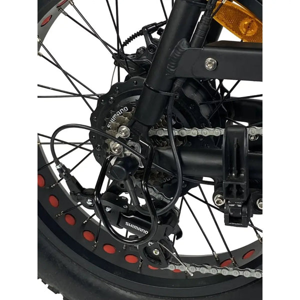 Close-up of the Cruz73 Unlimited Retro Fat Tyre 750W electric bike Shimano derailleur and rear gears.