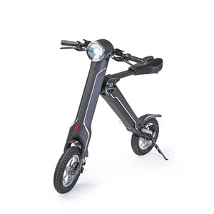 Front angle studio view of the black Cruzaa E-Scooter Pro, clearly displaying the unique 'K' frame shape and front disc brake.