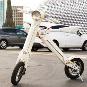 Side profile of the white Cruzaa E-Scooter Pro parked outdoors, showing its unique K-shaped frame design.