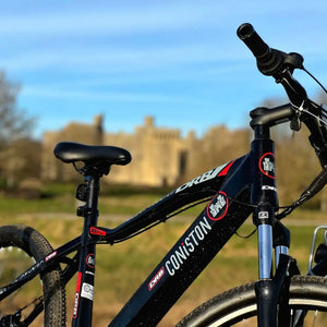 Close-up detail of the black alloy frame on the Dallingridge Coniston showing the "Coniston" and "DRB" logos.