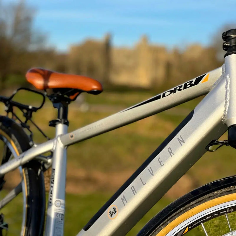 Close-up of the silver alloy frame on the Dallingridge Malvern showing the "Malvern" model name and "DRB" branding on the top tube.