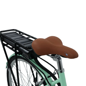 Close-up of the Dawes Elegance bike’s brown comfort saddle and rear battery rack setup.