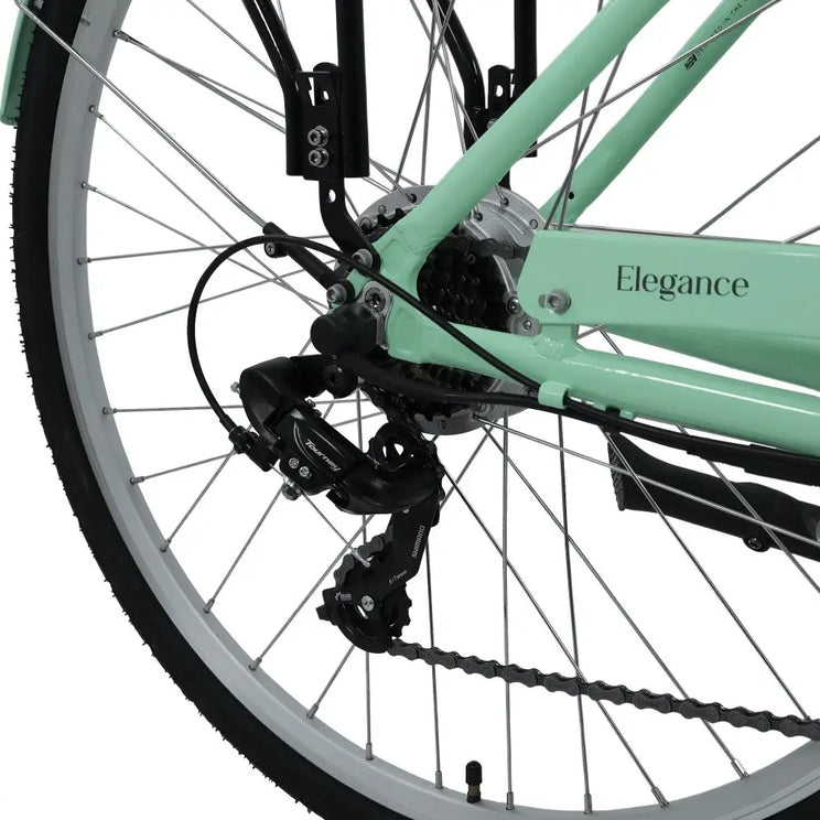 Close-up of the Dawes Elegance Low Step Electric Bike’s rear derailleur, wheel, and cassette with Shimano Tourney gear system.