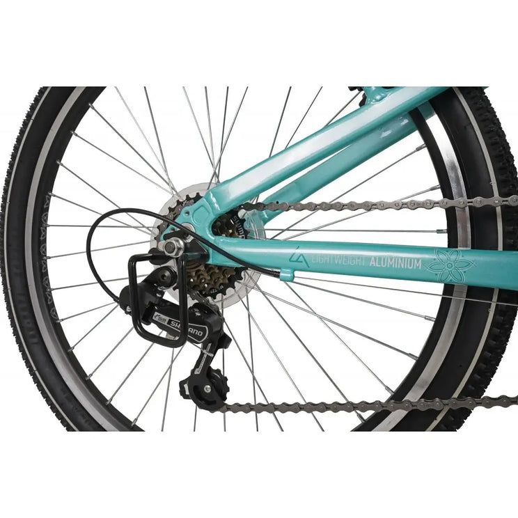 Close-up detail of the rear wheel on the Dawes Paris HT 24 bike featuring the Shimano rear derailleur, 6-speed gear system, and lightweight aluminium frame branding.