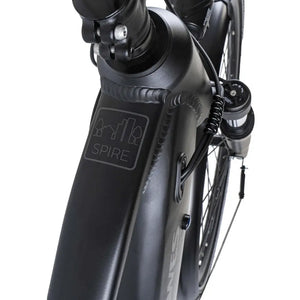 Close-up of the Dawes Spire 1.0 Crossbar electric hybrid bike frame showing the Spire logo near the handlebar stem.