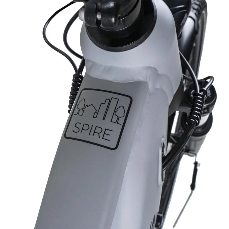 Front frame section of the Dawes Spire 2.0 Cues Crossbar electric hybrid bike in grey, showing the Spire logo.