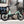 E-Go CarbonStep in Duck Egg with rear rack, parked in a town centre