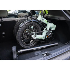 The E-Go Lite 3S folding e-bike and seatpost battery stored compactly in a car trunk/boot.